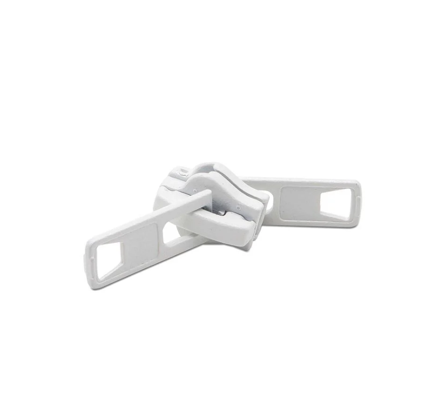 Deslizador doble p/cierre diente de perro 10mm blanco x unid